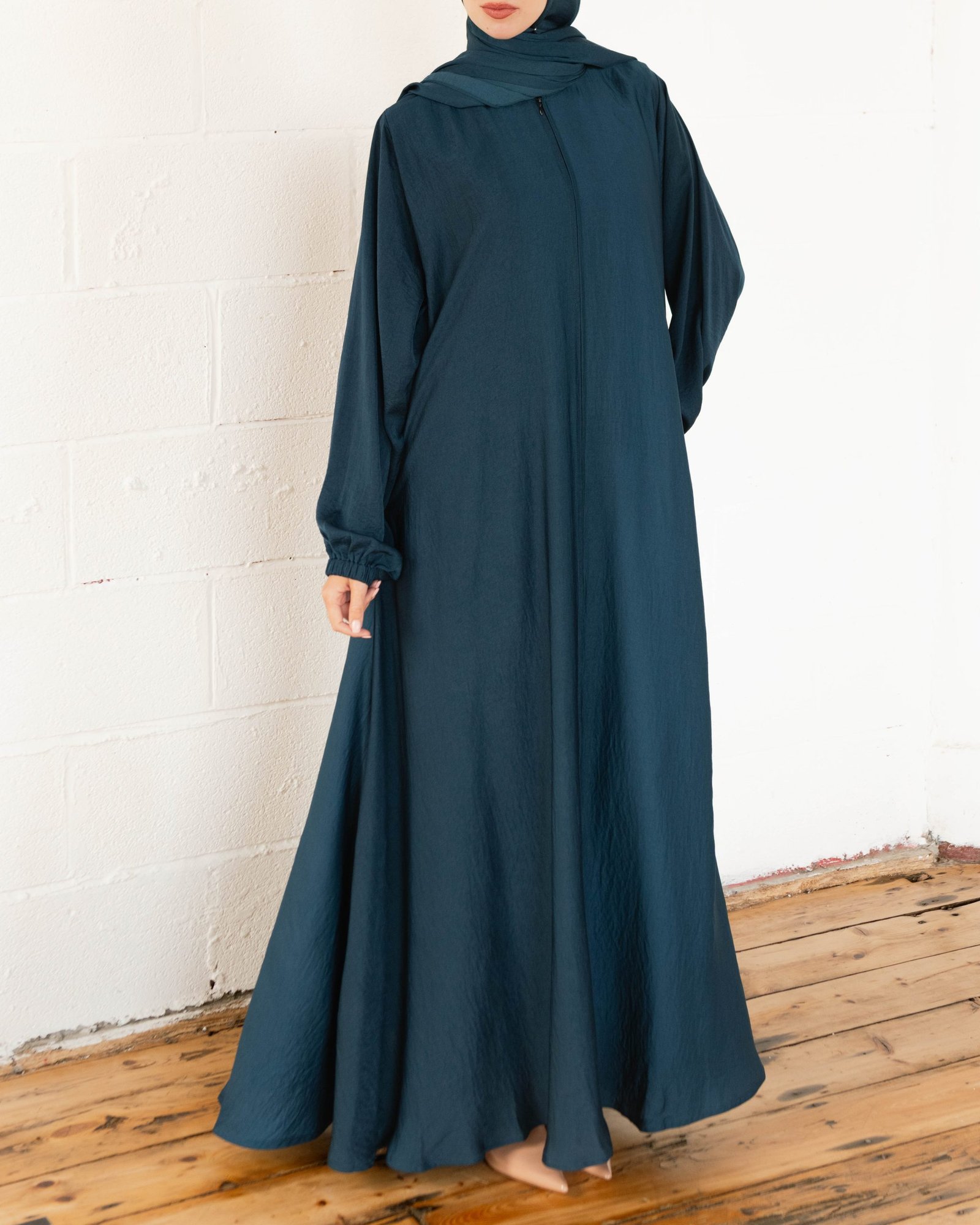 Rajaa in Teal